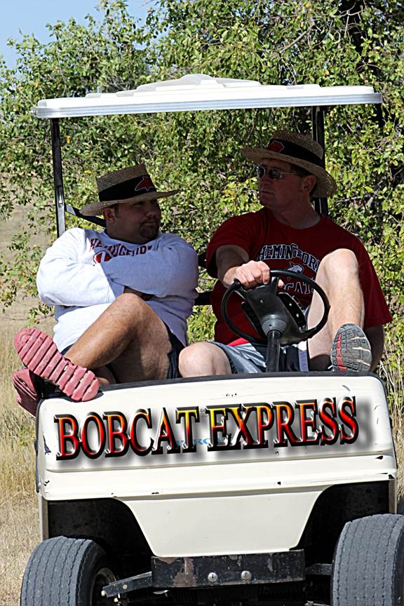 Description: \\fileserver01\staff\cningen\My Documents\My Pictures\Homecoming 2011\Bobcat Express (Coaches).JPG